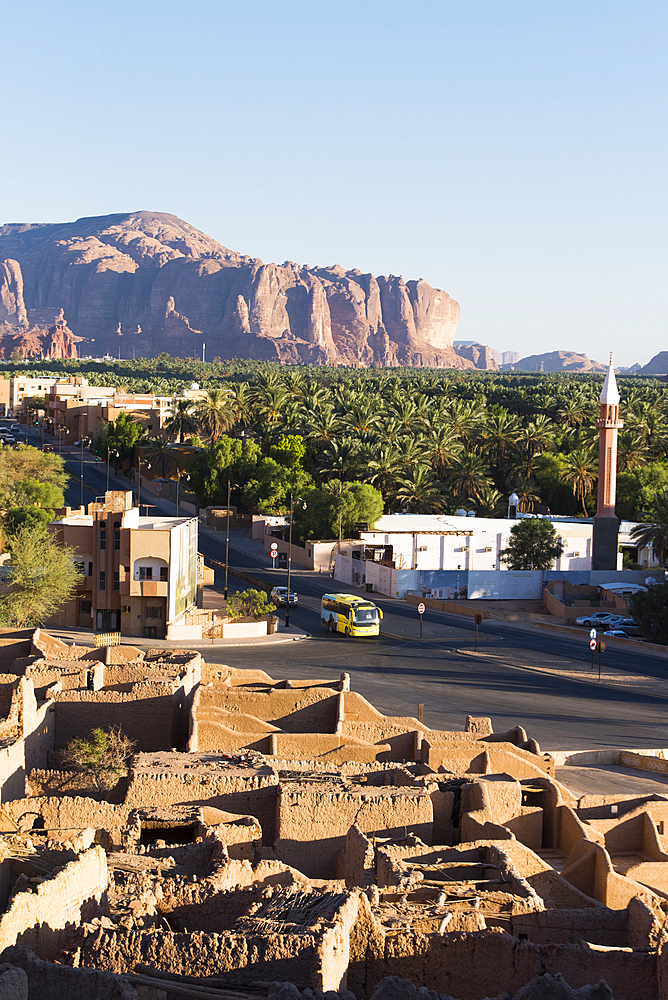 Old mudbrick village under reconstruction with date pelm groves in the background, Old town of AlUla, Medina Province, Saudi Arabia, Middle East