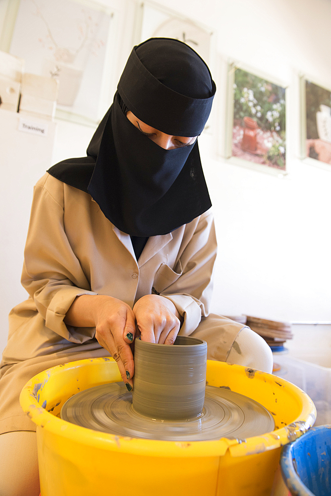 Madrasat Adeera, originaly a Girl's School, now an artistic space where women learn and practice different crafts, here a pottery workshop, whose creations will be sold at the market in the old town of AlUla, Medina Province, Saudi Arabia, Middle East