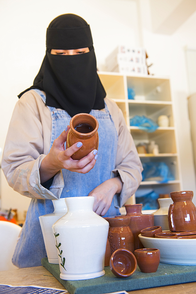 Madrasat Adeera, originaly a Girl's School, now an artistic space where women learn and practice different crafts, here a pottery workshop, whose creations will be sold at the market in the old town of AlUla, Medina Province, Saudi Arabia, Middle East