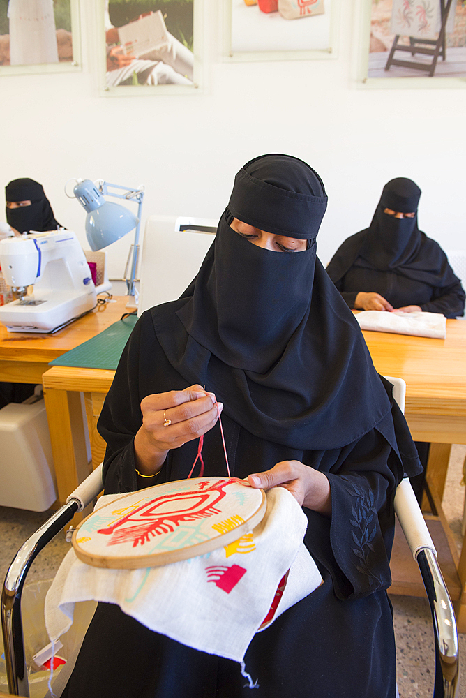 Madrasat Adeera, originaly a Girl's School, now an artistic space where women learn and practice different crafts, here a sewing and embroidery workshop, whose creations will be sold in the old town of AlUla, Medina Province, Saudi Arabia, Middle East