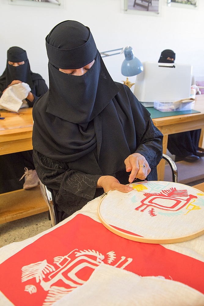 Madrasat Adeera, originaly a Girl's School, now an artistic space where women learn and practice different crafts, here a sewing and embroidery workshop, whose creations will be sold in the old town of AlUla, Medina Province, Saudi Arabia, Middle East