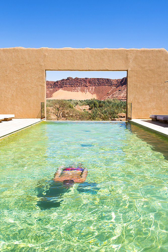 Swimming pool of Dar Tantora The House Hotel, a renovated original mudbrick village in the oasis of AlUla, Medina Province, Saudi Arabia, Middle East