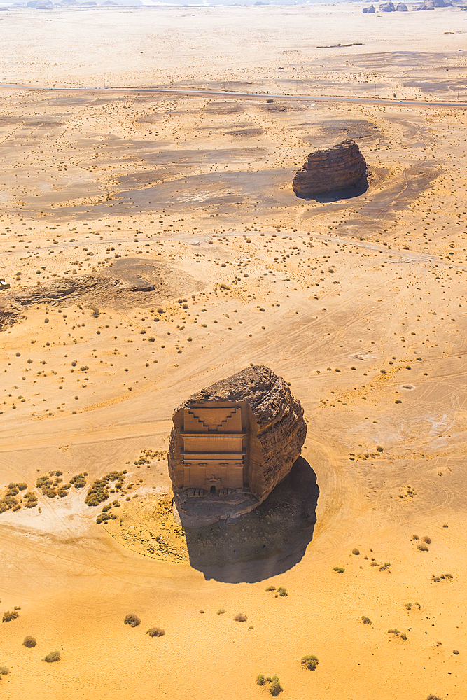 Aerial view of Qasr al-Farīd, the largest tomb within the UNESCO World Heritage Site of Hegra, also known as Mada'in Salih, in the area of AlUla, Medina Province, Saudi Arabia, Middle East