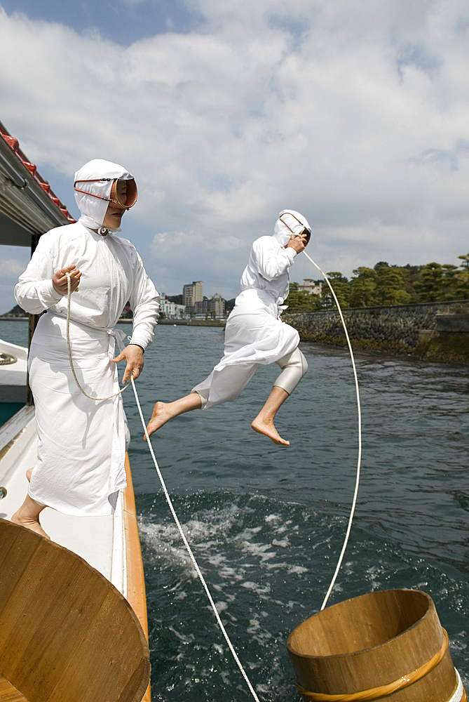 On the island of pearls of Mikimoto (named after the inventor and developer of the pearl culture: Kokichi Mikimoto 1858-1954), women divers in traditional clothing. Toba, Ise-Shima National Park, Japan