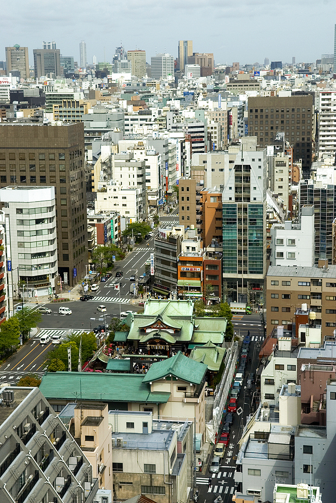 Suiten-gū (green roof), a Shinto shrine devoted to conception and safe childbirth, viewed from Royal Park Hotel, Chuo ward, Tokyo