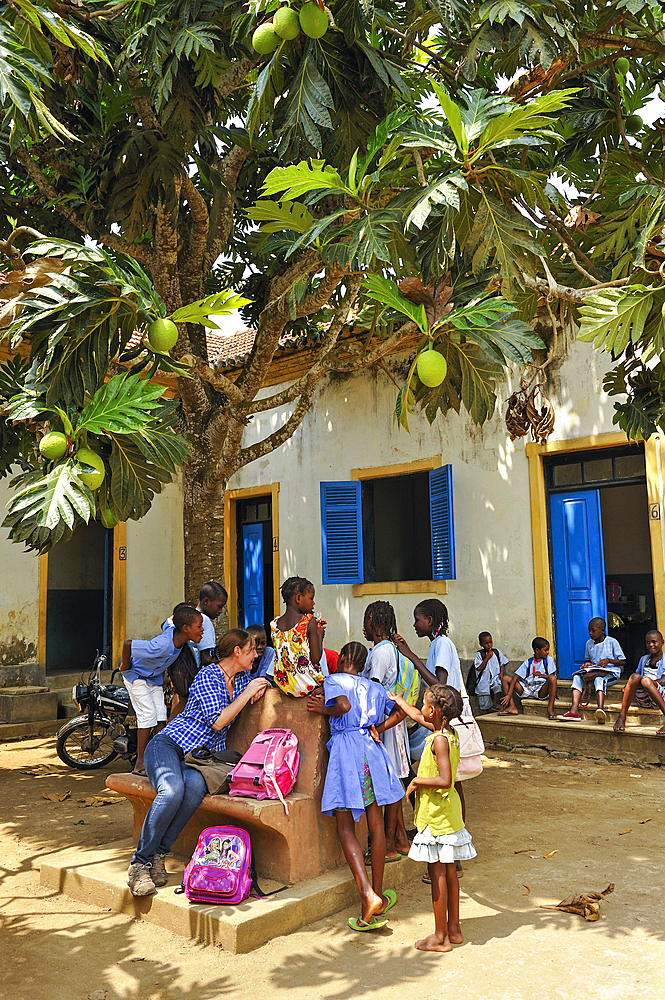 Pupils in the playground of the primary school in the village of Praia das Conchas, in the northern part of Sao Tome Island, Republic of Sao Tome and Principe,Africa