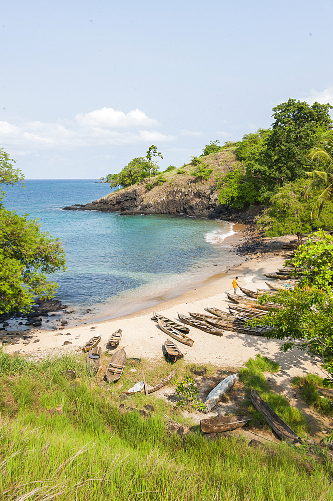 Fisherman's pirogues on a beach of the north coast of Sao Tome Island, Republic of Sao Tome and Principe,Africa