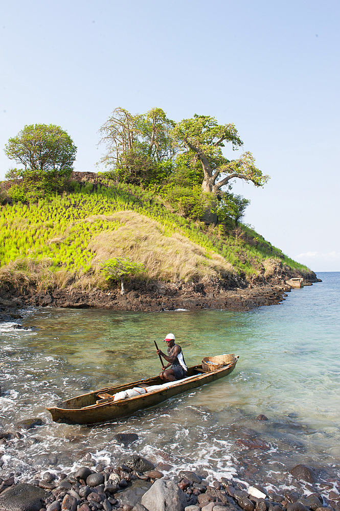 Fisherman in small cove Lagoa Azul on the north coast of Sao Tome Island, Republic of Sao Tome and Principe,Africa