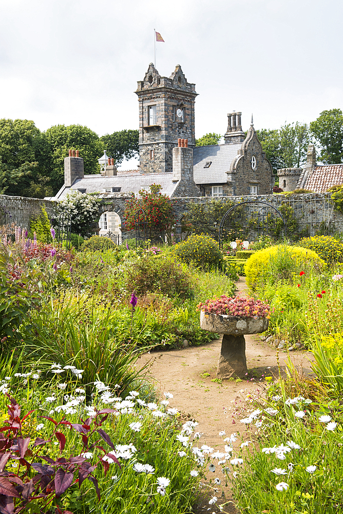 The walled garden with the house in the background, La Seignerie (17th Century), traditional residence of the Seigneur of Sark, Open to the public for the visit of the gardens, Sark island, Channel Islands, Bailiwick of Guernsey, United Kingdom