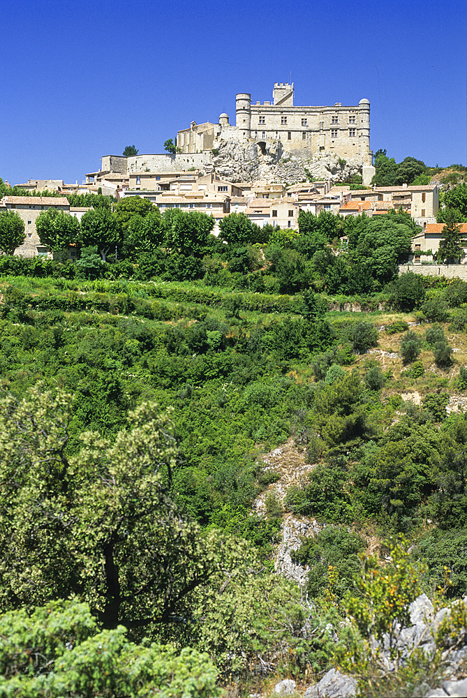 Castle and village of Le Barroux at the foot of Mont Ventoux,Vaucluse department,Provence-Alpes-Cote d'Azur region,southeast of France,Europe