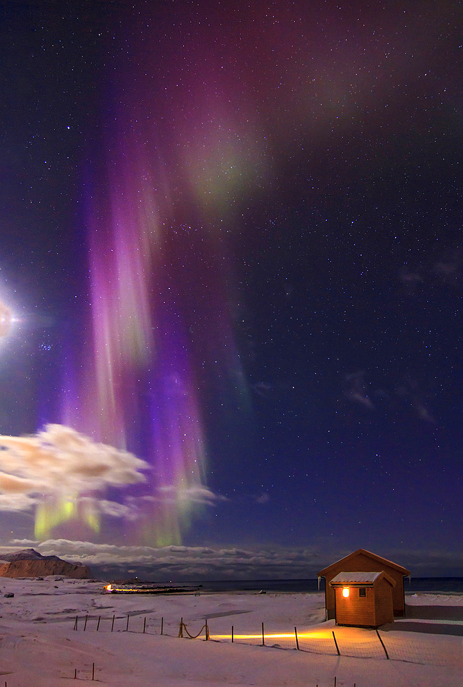 Northern lights above Flakstad beach (Lofoten Islands), Norway.