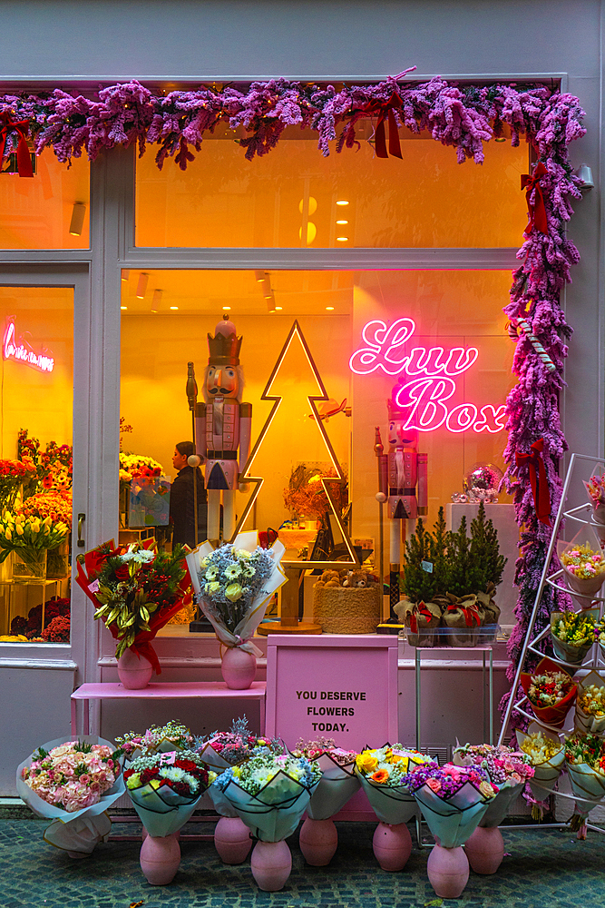 Pink flower shop Luv Box on Rue Bachaument at Christmas, Paris, France