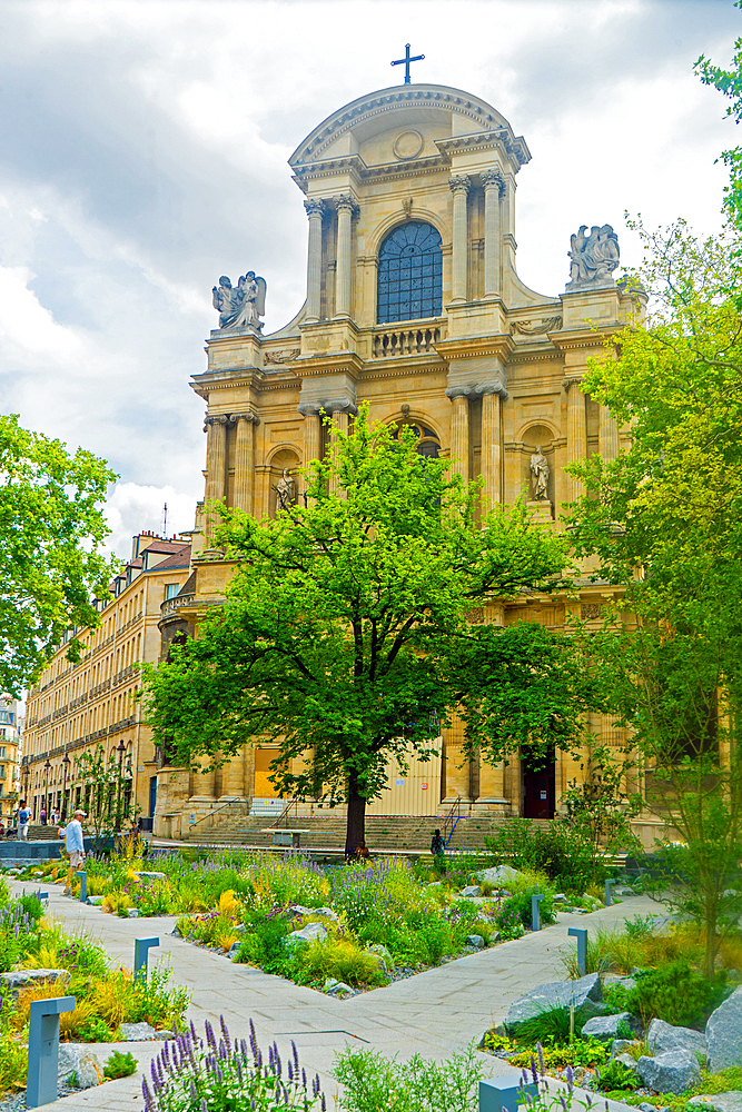 Garden to commemorate terrorist actions on 13 November in front of church Saint-Gervais-Saint-Protais in day in summer
