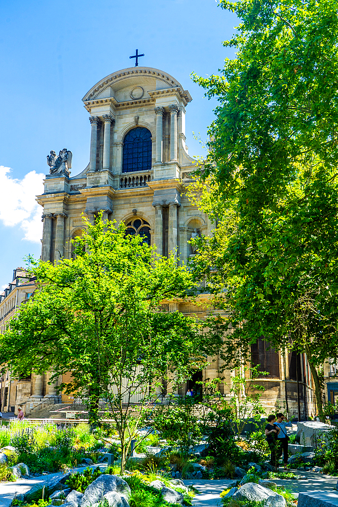 Garden to commemorate terrorist actions on 13 November in front of church Saint-Gervais-Saint-Protais in day in summer