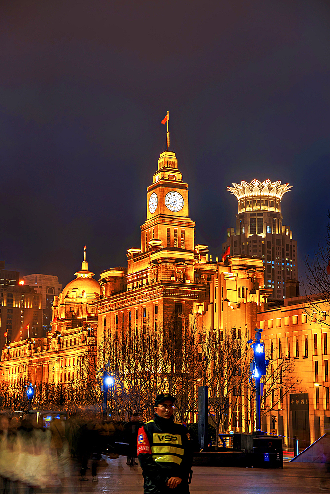 Magnificent view of brightly lit heritage buildings along the Bund at night, Shanghai, China