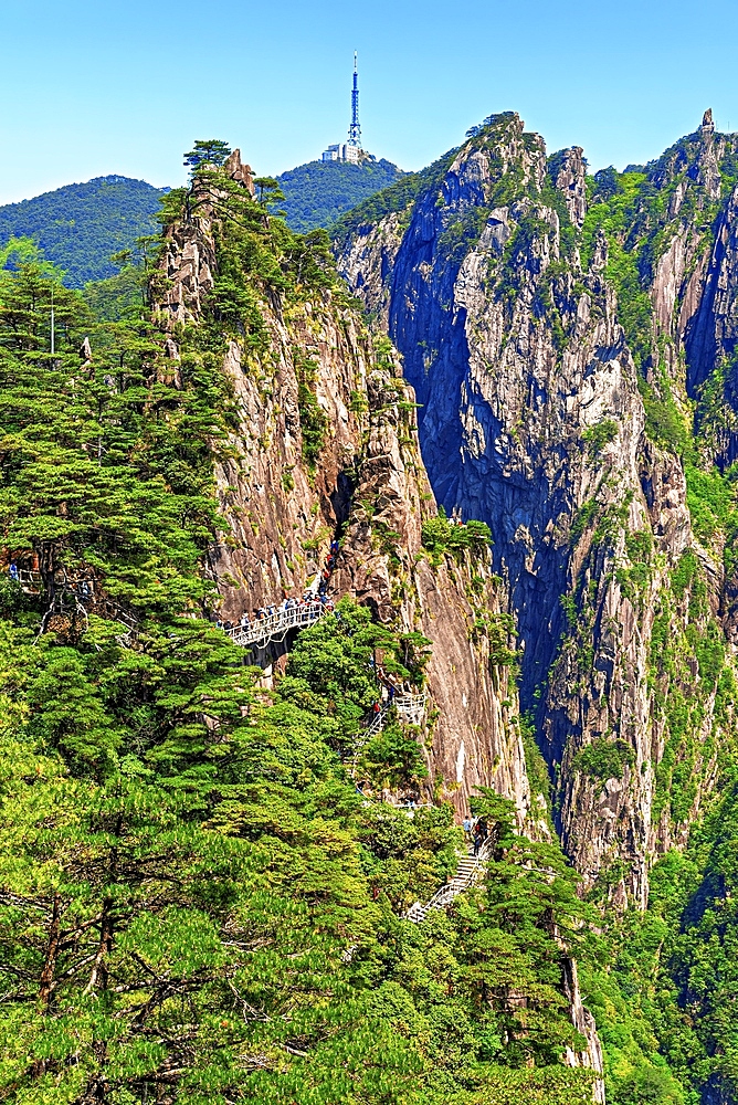 Cliffside walkways and steep steps in Huangshan (Mt Huang), UNESCO World Heritage and UNESCO Global Geopark, Anhui Province, China.