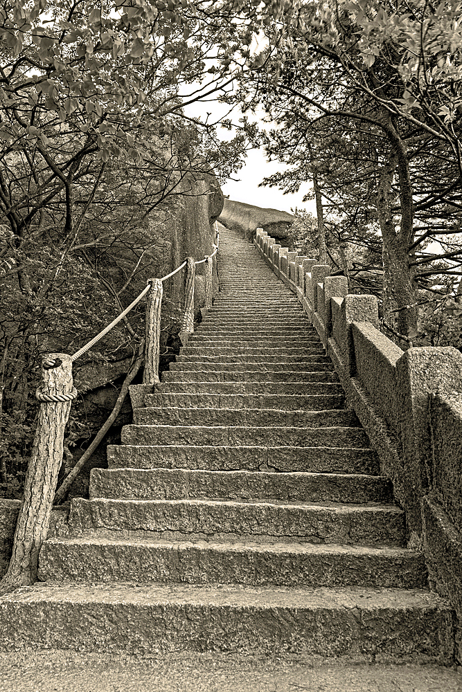 Never ending steep steps in Huangshan (Mt Huang/Yellow Mountain), UNESCO World Heritage and UNESCO Global Geopark, Anhui Province, China.