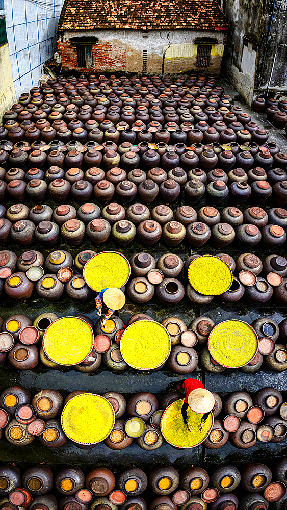 Local workers making soy sauce, aerial view, Hanoi, Vietnam
