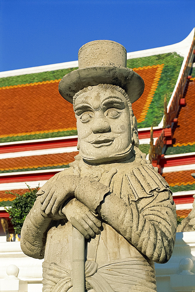 Close-up of a stone statue of a Farang guard at the temple of Wat Pho in Bangkok, Thailand, Southeast Asia, Asia