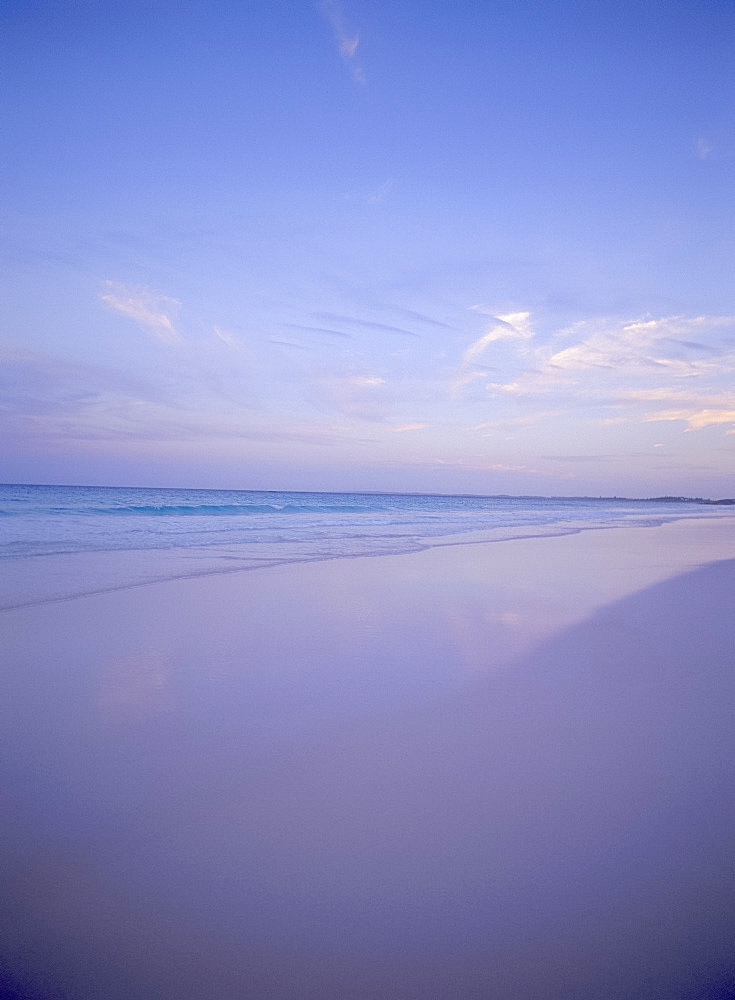 Sea and sand at sunset at Pink Sands Beach, Harbour Island, Eleuthera, The Bahamas