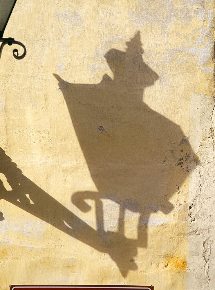 Street lamp shadow on old wall, Tallinn, Estonia, Baltic States, Europe