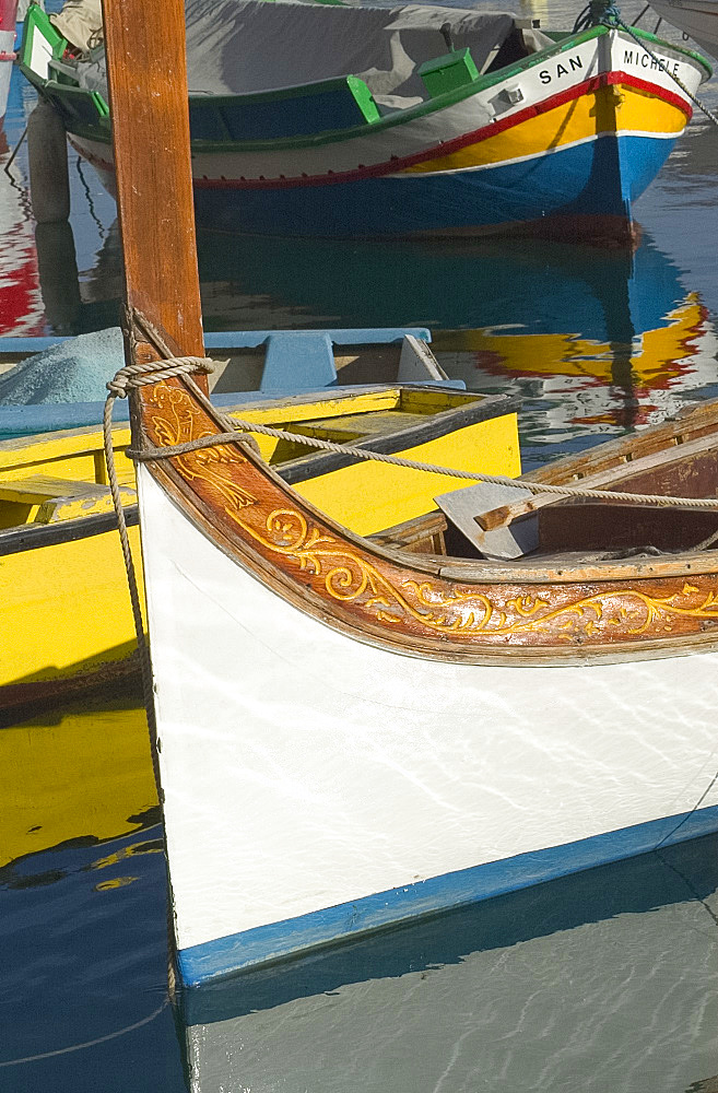 Wooden boat with decorative carving on the bow, Malta, Mediterranean, Europe