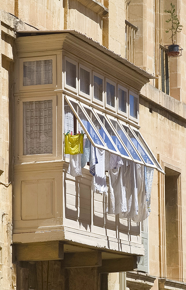 Laundry hanging out of a window, Valletta, Malta, Mediterranean, Europe