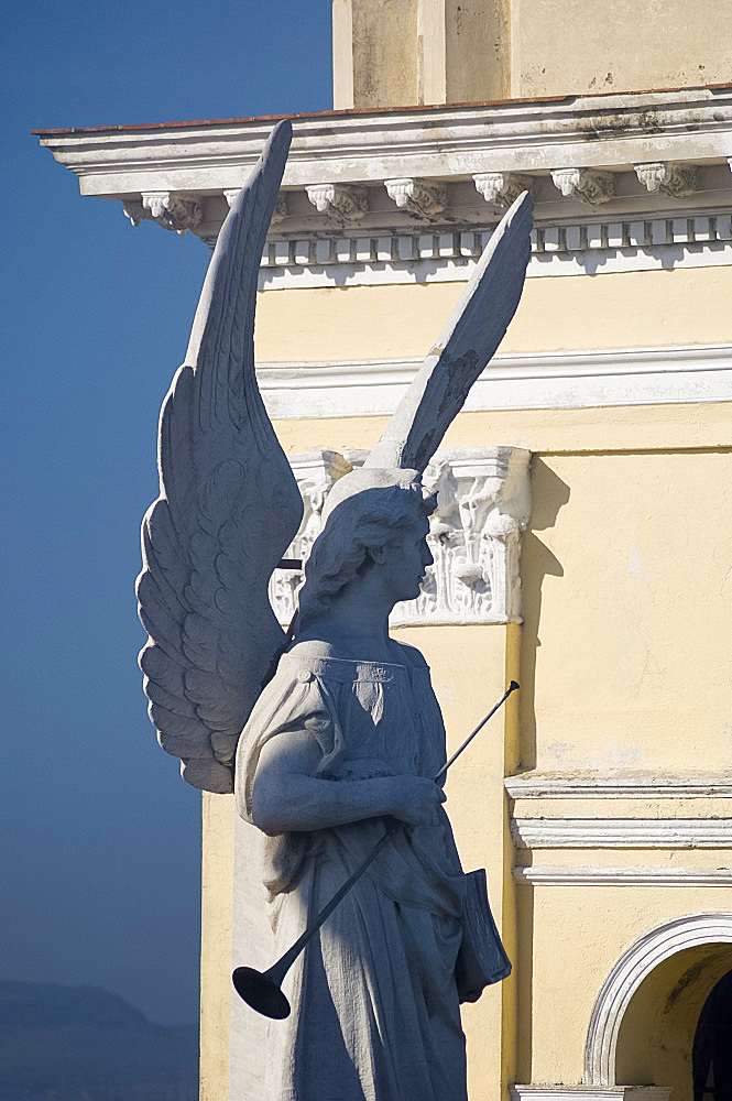 The statue of an angel on the Catedral de Nuestra Senora de la Asuncion, Parque Cespedes, Santiago de Cuba, Cuba, West Indies, Central America