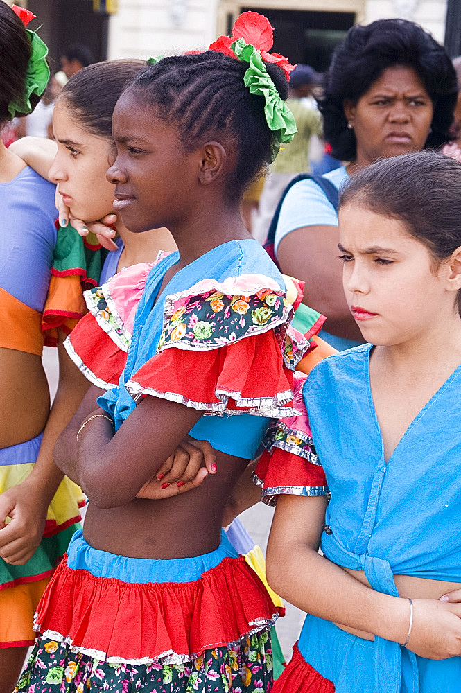 School girls dressed in colourful costumes for a school festival, Santiago de Cuba, Cuba, West Indies, Central America