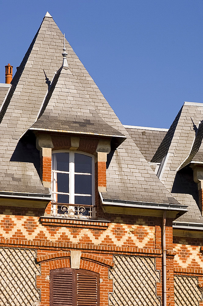 Elaborate brickwork on a house in the seaside town of Houlgate, Normandy, France, Europe