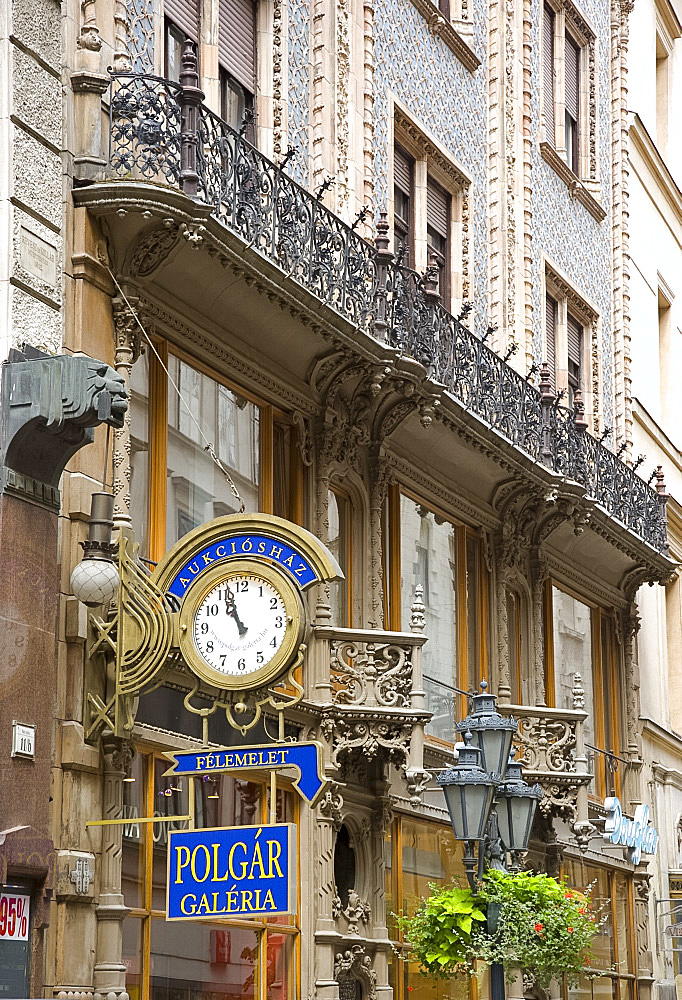 The ornate facade of a building in Vaci Street, a pedestrian shopping area in the Pest side of Budapest, Hungary, Europe