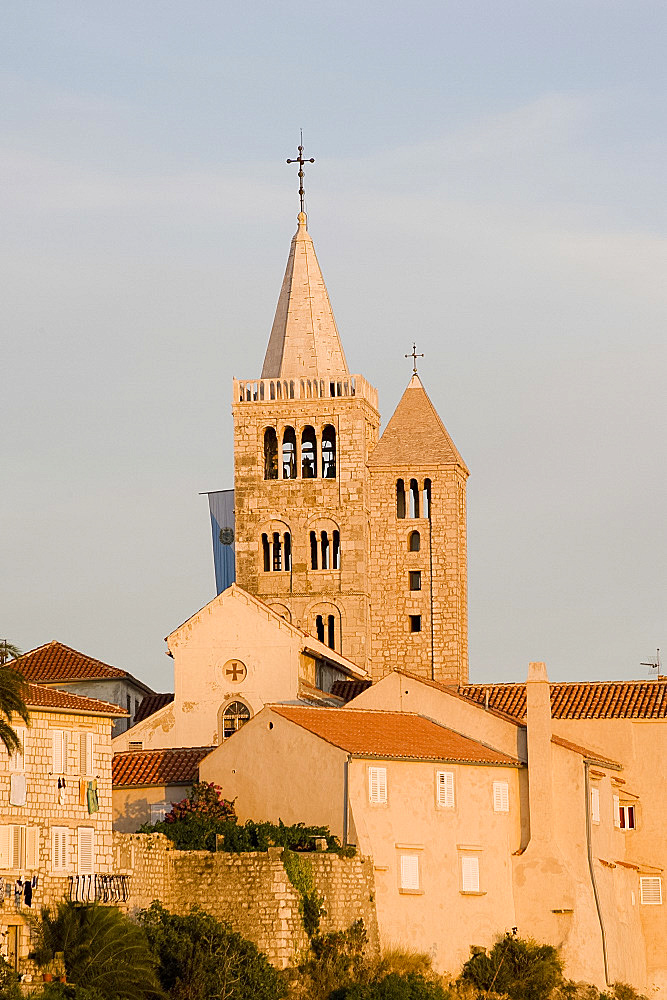 Late afternoon sunlight on the bell towers in Rab Town, Rab Island, Kvarner region, Croatia, Europe