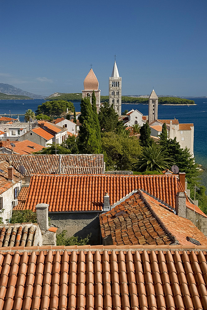 A view of the terracotta rooftops and medieval bell towers in Rab Town, island of Rab, Kvarner region, Croatia, Europe