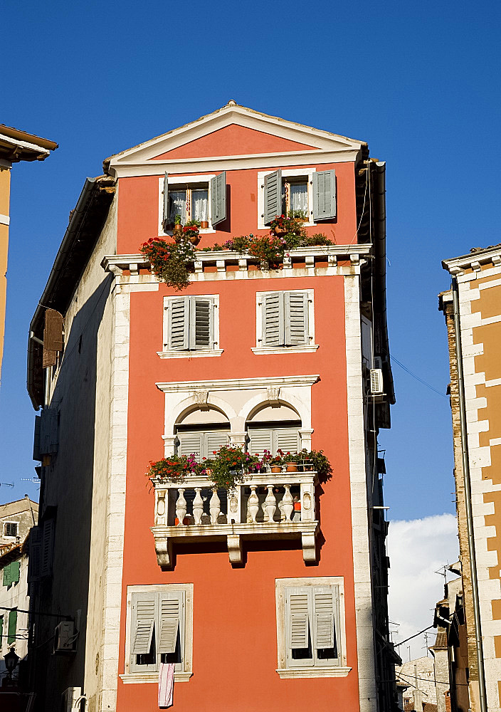 A brightly colored building in Rovinj, Istria, Croatia, Europe