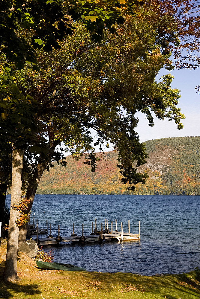 View across Lake George to mountains covered with autumn foliage, Lake George, Adirondack Mountains, New York State, United States of America, North America