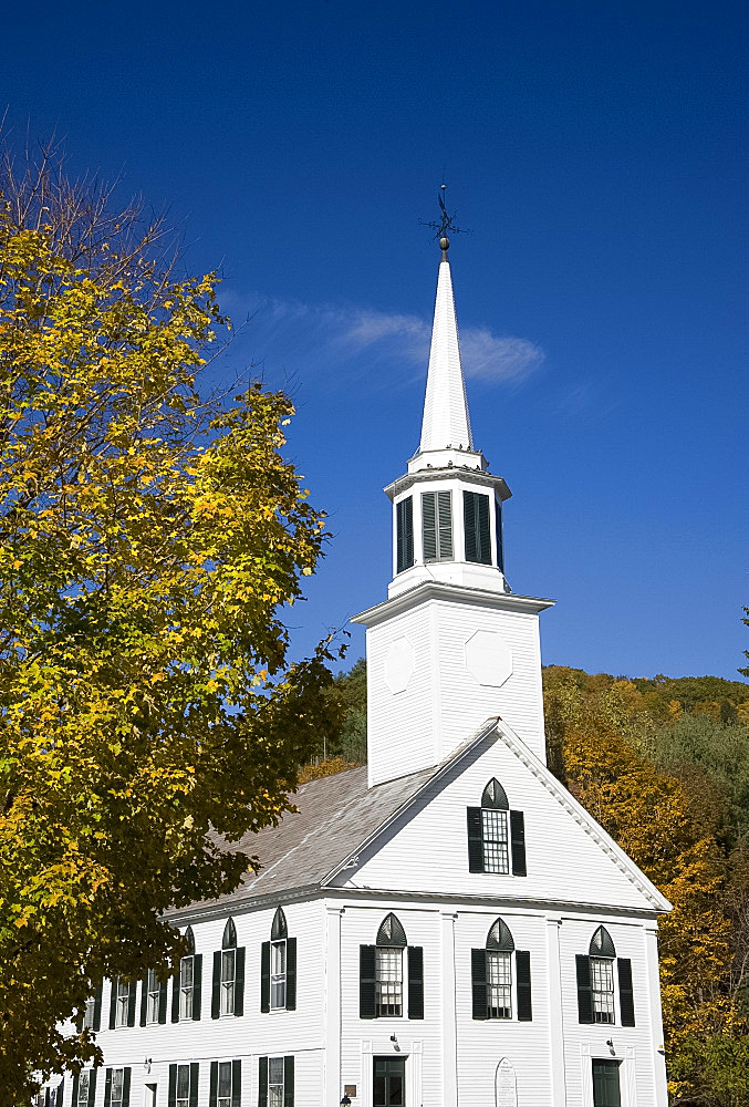 Traditional white church surrounded by autumn foliage in Townshend, Vermont, New England, United States of America, North America