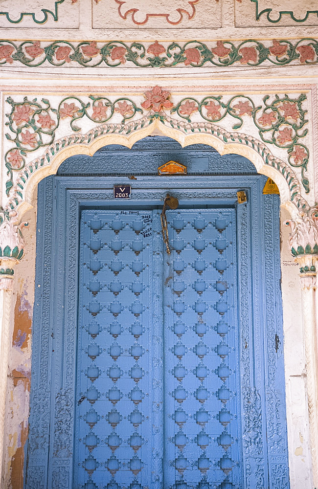 An ornate painted doorway in Old Delhi, India, Asia