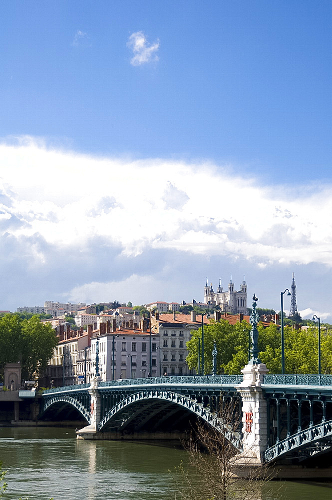 The Pont de l'Universite over the River Rhone and the Lyon skyline, Lyon, France, Europe