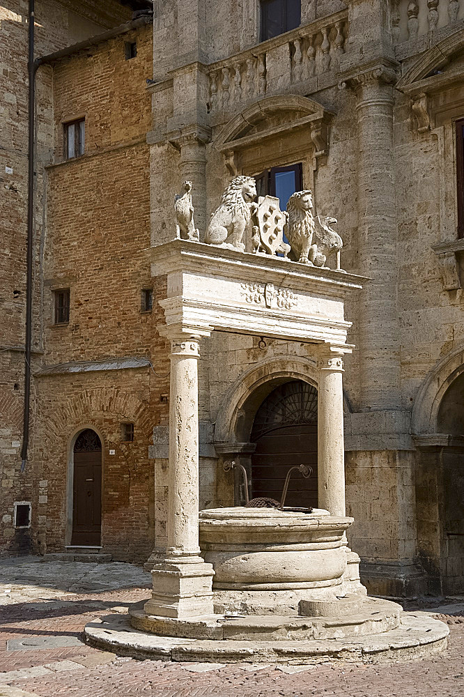 An old ornate marble well in Montepulciano, Tuscany, Italy, Europe