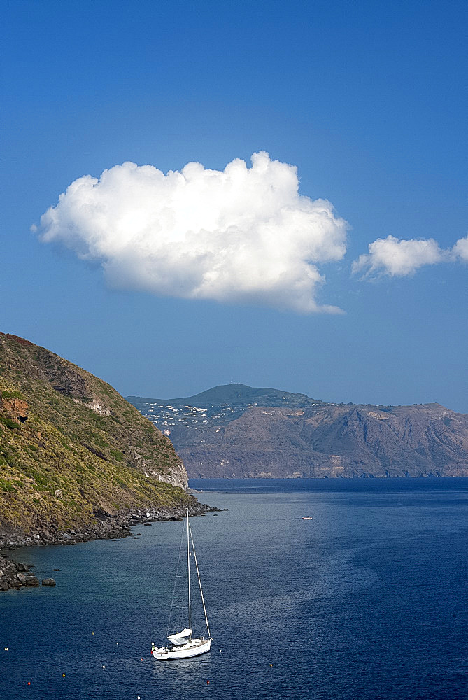 Rocky cliffs rising from the sea near Pollara on the island of Salina, The Aeolian Islands, UNESCO World Heritage Site, off Sicily, Messina Province, Italy, Mediterranean, Europe