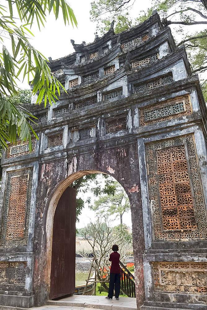 An ornately decorated gate in the grounds of the Tu Duc Tomb near Hue, Vietnam, Indochina, Southeast Asia, Asia