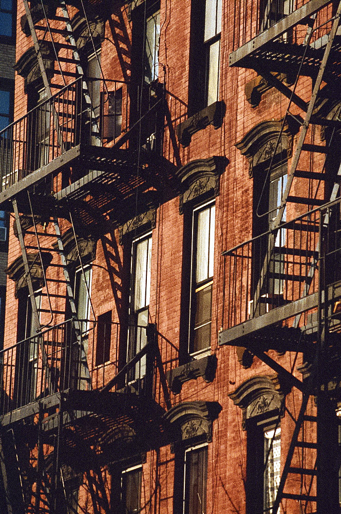 Detail of building with fire escapes, Manhattan, New York City, United States of America, North America