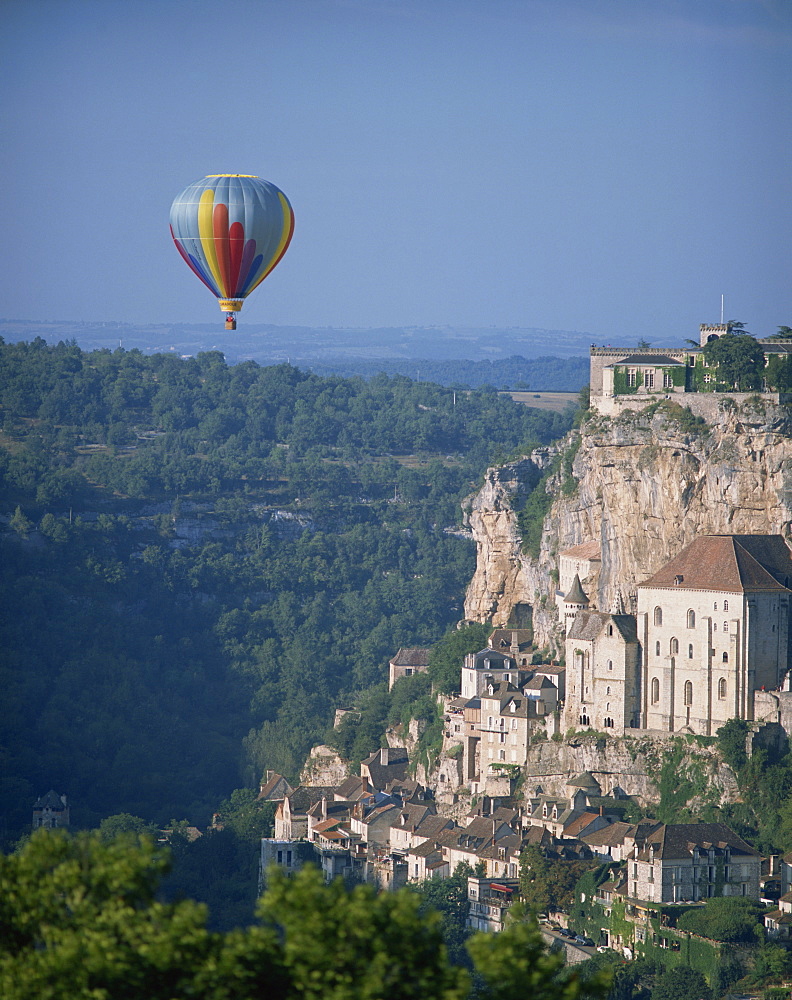 Hot air balloon above the valley at Rocamador in the Dordogne area of the Midi Pyrenees, France, Europe