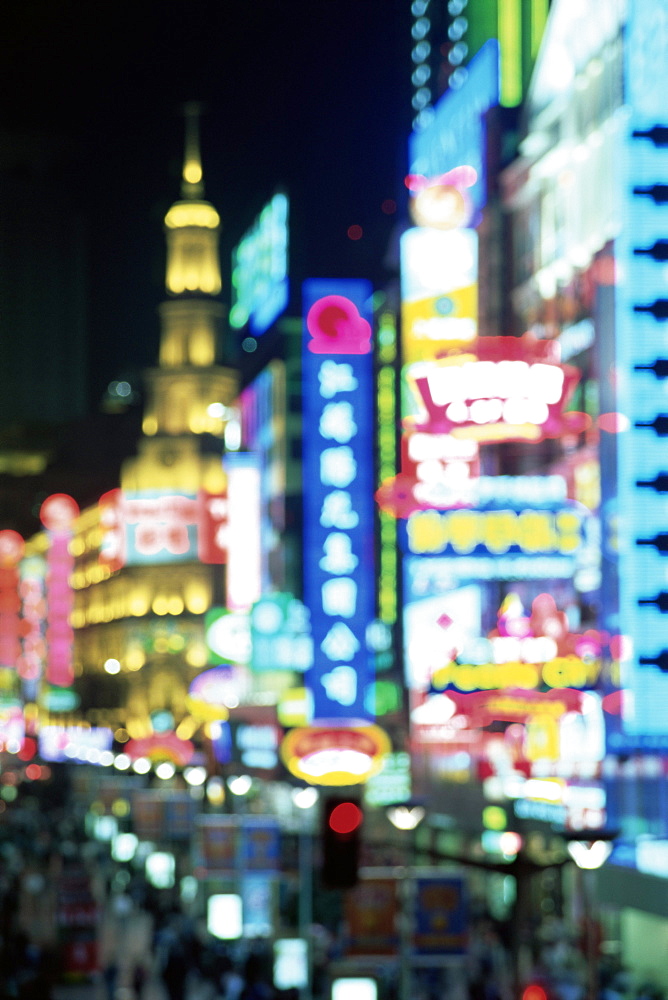 Blurred neon lights at night, Nanjing Dong Lu new pedestrian street, Nanjing Road, Shanghai, China, Asia