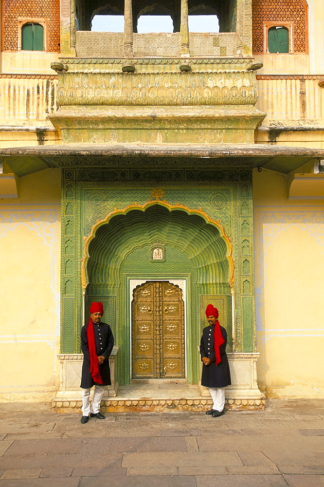 Palace guards in turbans at gateway, the ornate peacock, City Palace, Jaipur, Rajasthan state, India, Asia