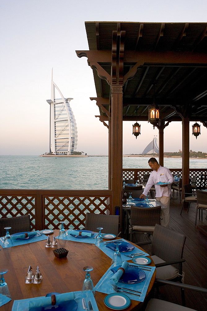 The Burj Al Arab, the world's first seven star hotel (five star deluxe), built on an artificial Island offshore from the Jumeirah Beach hotel, Dubai, United Arab Emirates, Middle East