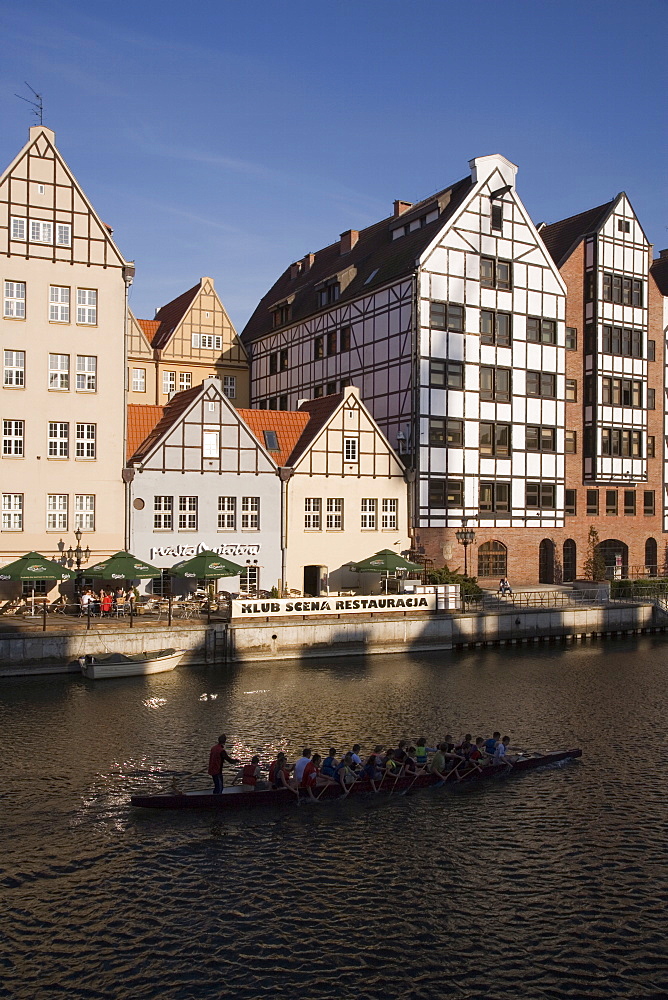 Restored warehouses along the Stara Motlawa River (Mottla River), Gdansk, Pomerania, Poland, Europe