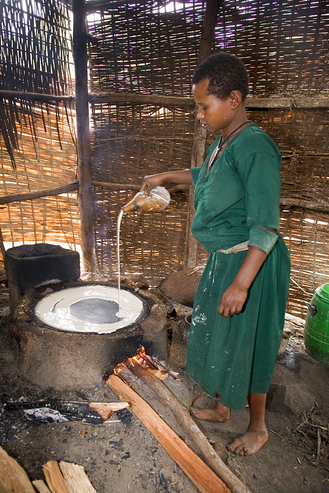 Woman making Injera, the staple diet, Ethiopia, Africa