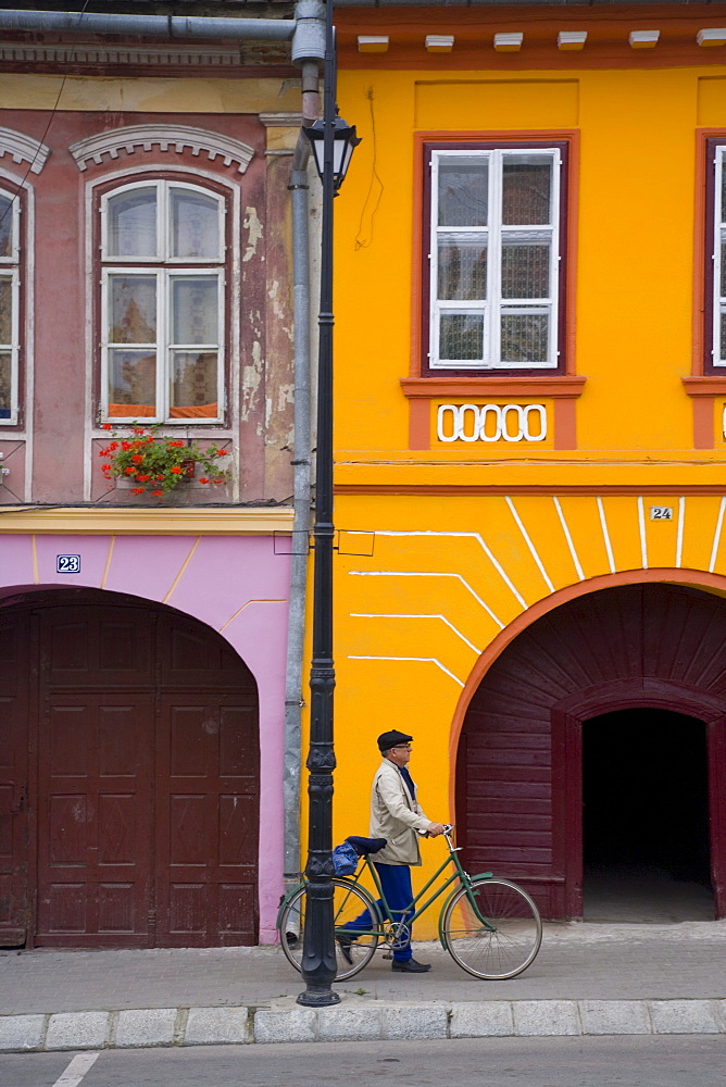 Detail of colourfully painted houses in medieval citadel town, Sighisoara, UNESCO World Heritage Site, Transylvania, Romania, Europe