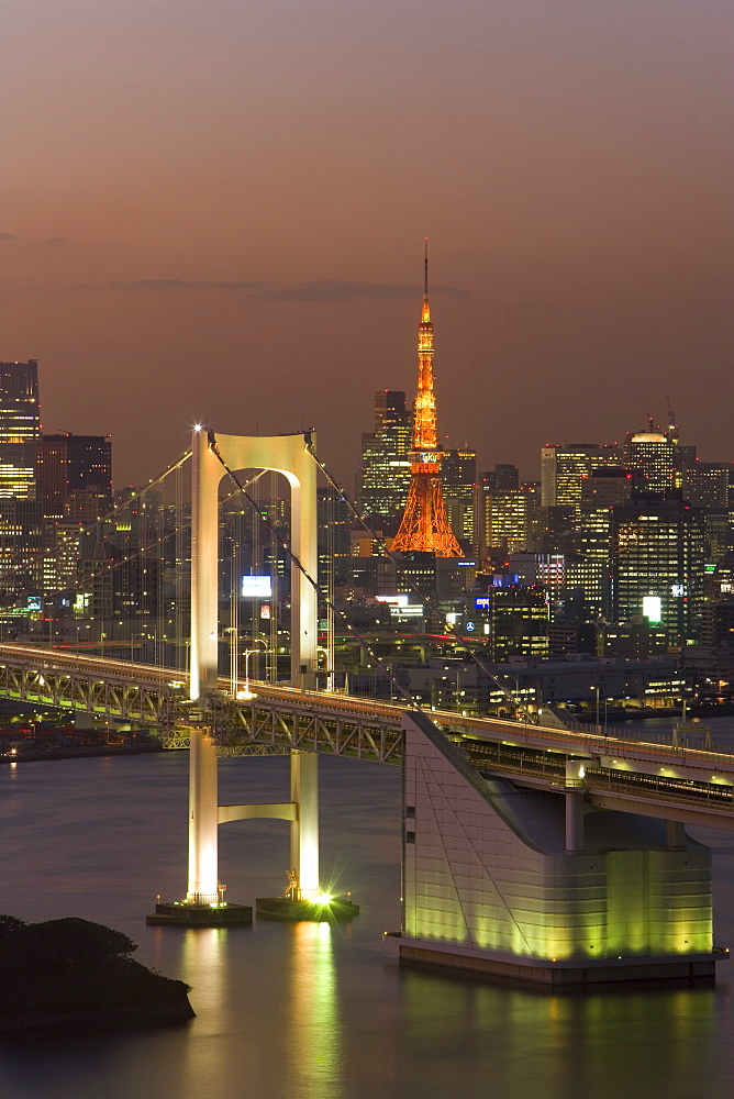 Elevated view of Rainbow Bridge and Tokyo Tower illuminated at dusk, Odaiba, Tokyo Bay, Tokyo, Honshu, Japan, Asia